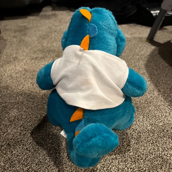 Vintage 90s Planet Hollywood Blue Dinosaur Stuffed Plush Animal w Orlando Shirt - Picture 3 of 9